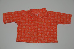 Orange skjorte med blade